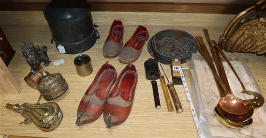 A brass flask, Turkish slippers, a brass pot, a Chinese food container, a brass spoons, Chinese mirrors etc.